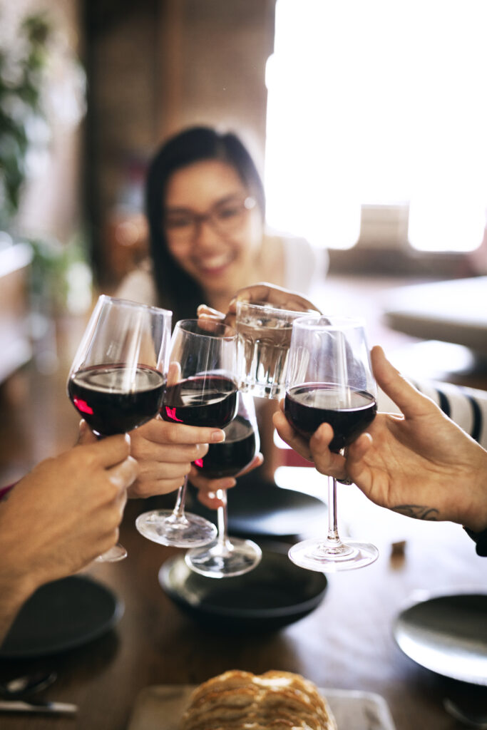 Friends making a toast at a dinner party
